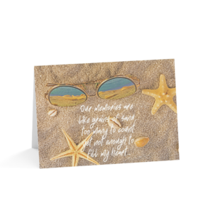 Printable friendship greeting card featuring a sandy beach background with starfish, seashells, and reflective sunglasses. The card reads, "Our memories are like grains of sand, too many to count yet not enough to fill my heart." A heartfelt coastal-themed friendship card designed for best friends, soul sisters, and meaningful friendship celebrations by LV Creative Concepts.